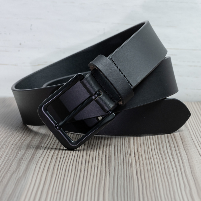 Black Mountain Leather Belt coiled. Black-on-black style.