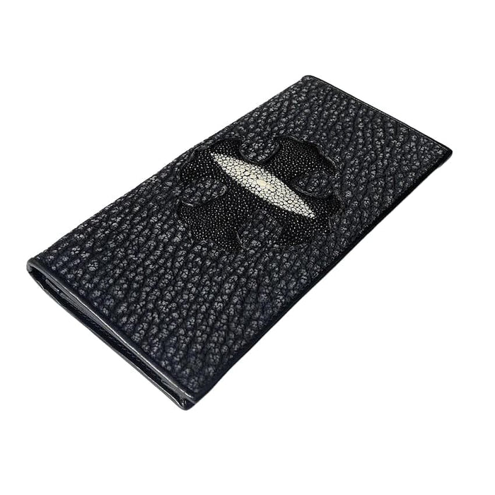 Black stingray leather long wallet with a textured surface, featuring a white stingray eye centered in a raised black cross, viewed from an angle