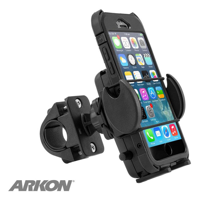 A Mega Grip™ Phone Holder with Handlebar Mount in black, featuring a mounting bracket for handlebars, securely holds an iPhone showing its home screen. The Arkon logo is displayed in the bottom left corner.