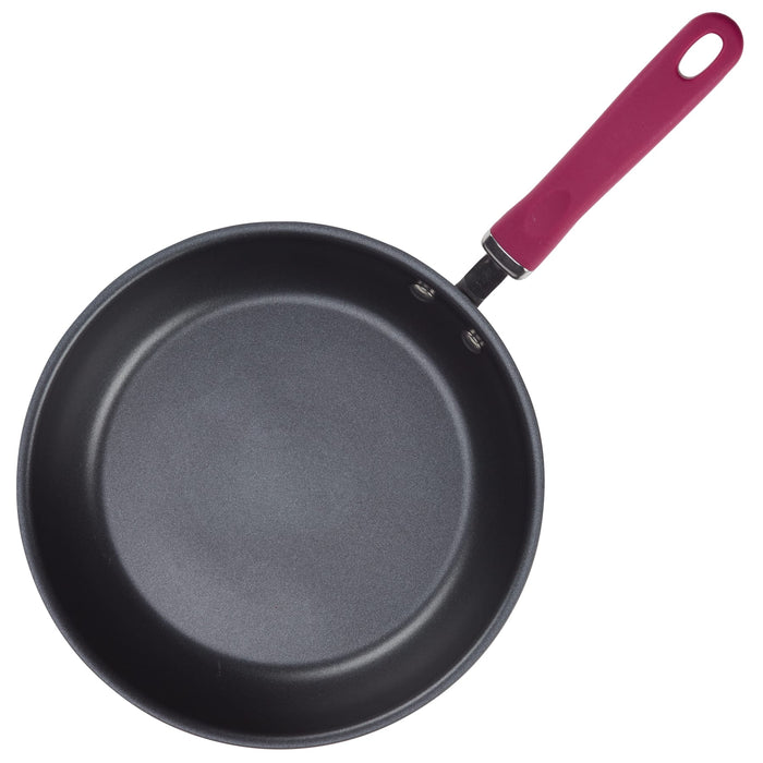 Hard anodized nonstick pan from 11-piece induction cookware set, red handle.