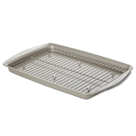 The 13-Inch x 19-Inch Jumbo Nonstick Sheet Pan with Rack, crafted from heavy gauge steel, is elegantly placed on a white background.