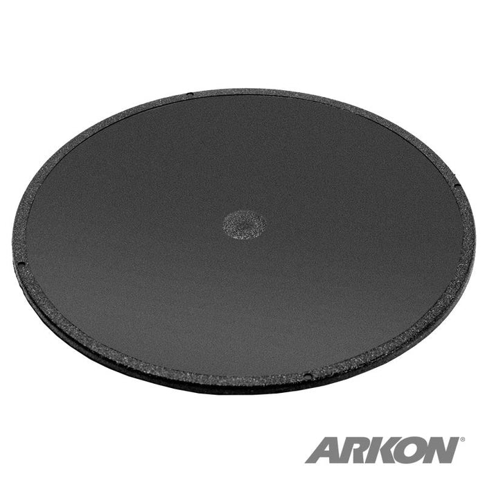 The 90mm Adhesive Dash Mounting Disk for 80mm Suction Mounts is a round, flat black disk with a textured edge, ideal for dashboards or as a dash mount disc for windshield suction mounts. Features ARKON logo in the bottom right corner.