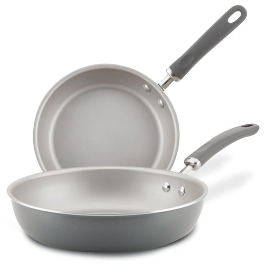 9.5" and 11.75" gray nonstick pans with black handles on a white background.