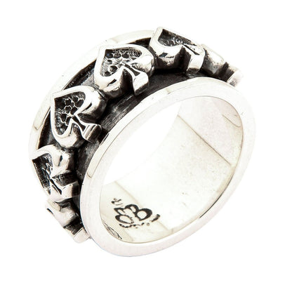 Angled view of 925 sterling silver ace of spades spinner ring displaying three-dimensional spade designs