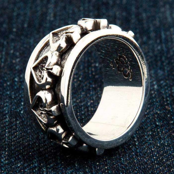 Side profile of ace of spades spinner ring showing 14mm band width and spinning mechanism