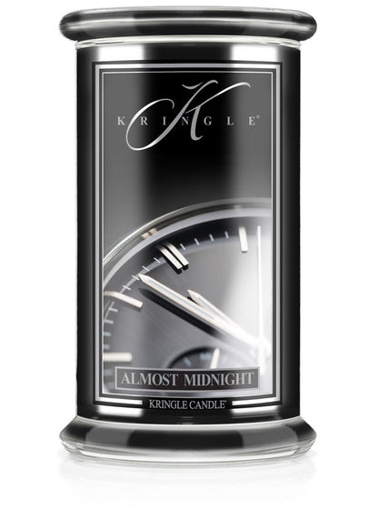 Kringle Candle jar labeled 'Almost Midnight' on a white background