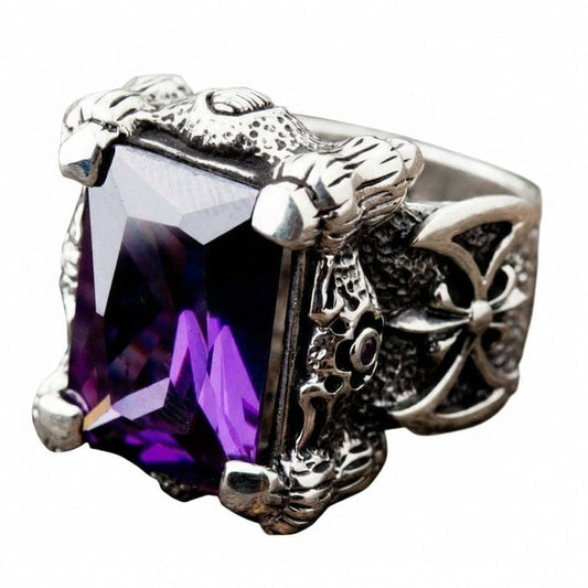 Amethyst dragon claw sterling silver ring with faceted purple gemstone, fleur-de-lis band detail, and oxidized gothic setting