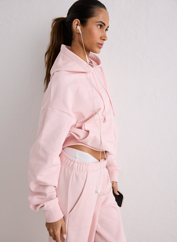 A woman wearing a pink ballerina Apparel Chunky Terry Hood by aim'n [S-170cm]