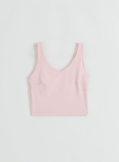 A flatlay of the pink Ballerina Sense Bralette by aim'n