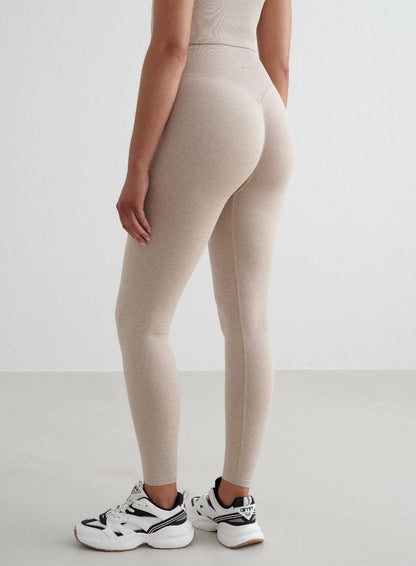 Beige melange aim'n Shape Seamless Tights featuring an invisible scrunch and a high-waisted fit.