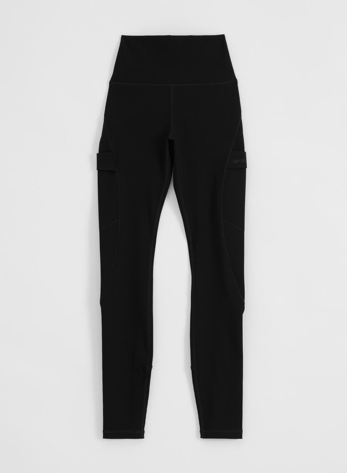 Black ribbed performance pocket tights with a high waist by aim'n, shown in a flatlay view.