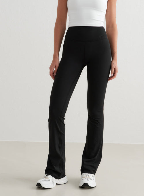 Black aim'n Sense Flare Tights featuring a high-waisted fit and flared leg, made from buttery-soft squat proof fabric.