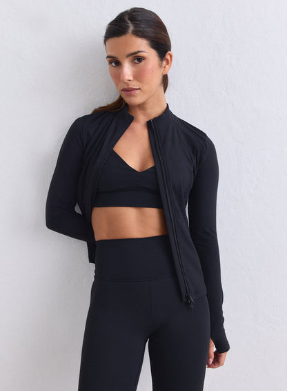Black aim'n Sense Zip Jacket made from peachy soft fabric, featuring thumbholes and a two-way zip. [XS-165cm]