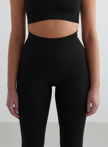 Front close-up of black Shape Seamless Tights by aim'n with a high ribbed waistband [S - 175 cm]