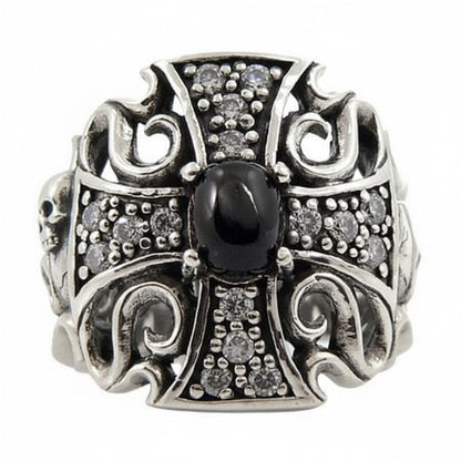 A front view of the black star gothic cross ring in sterling silver, showing the central cabochon and pave stones.