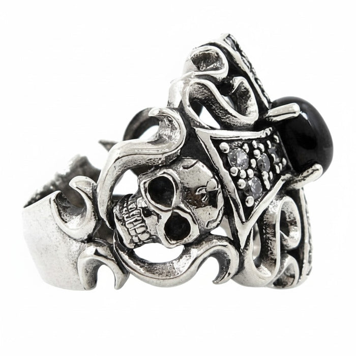 The side of the ornate silver cross ring