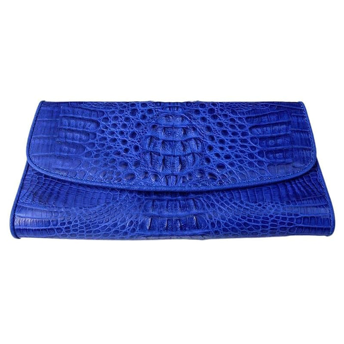 A genuine crocodile skin wallet for women in a vibrant blue color.