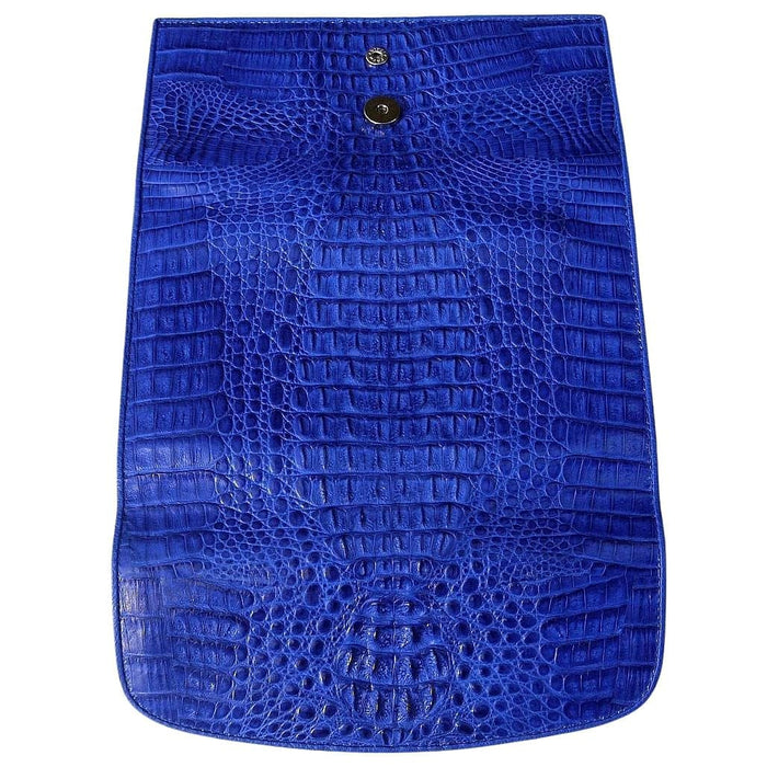 The open flap of the blue crocodile hornback wallet, displaying the magnetic snap and full scale pattern.