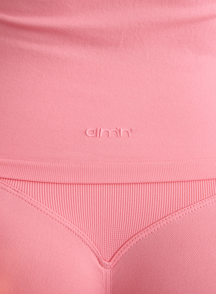 Close-up of the aim'n logo and ribbed texture on the Blush Shape Seamless One Shoulder Bralette [L-174cm]