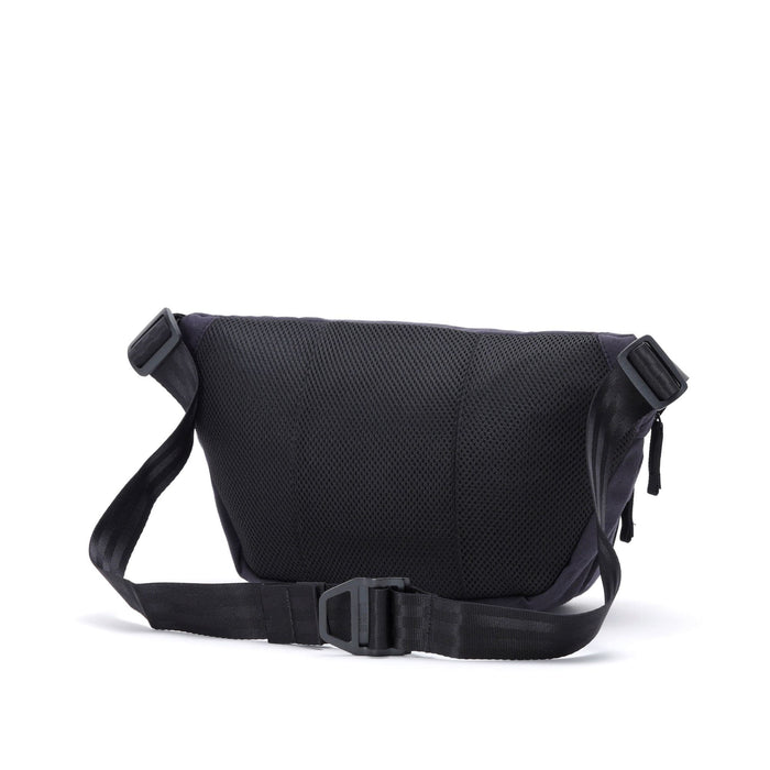 The back of the Bot Flap 5L Sling n Black Canvas Leather #color_black canvas leather