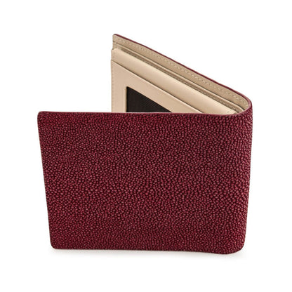 A highly durable and sophisticated Shagreen (polished stingray) wallet in a classic, deep burgundy color.