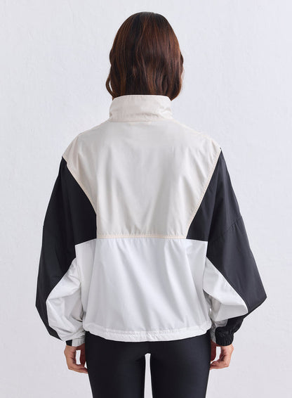 Back view of the aim'n Café Au Lait Balance Blocked Windstopper Jacket with a relaxed fit [S-165cm]