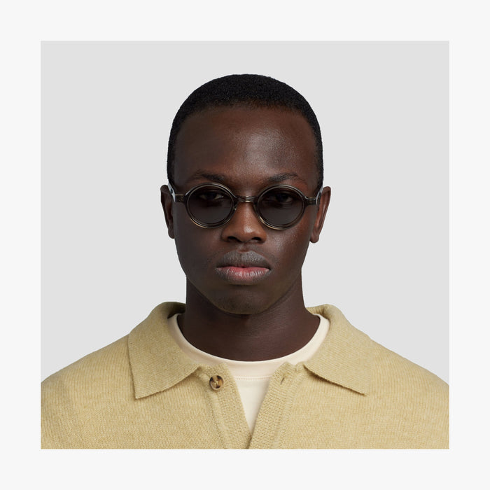Crystal Sencha / Grey Green Lens | Front view of male model wearing Cairn Sunglasses in Crystal Sencha with Grey Green Lens