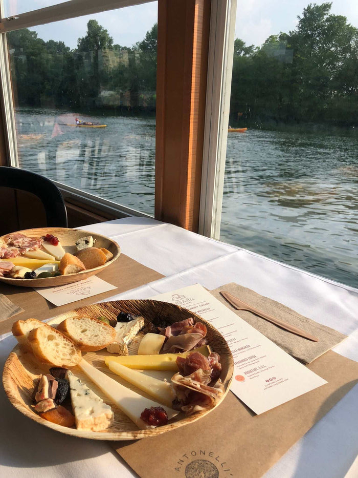 Image of a cheese plate on a Cheese-y Boat Cruise