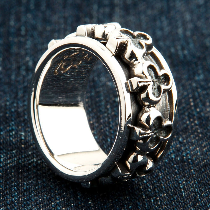 Side profile of club sterling silver spinner ring displaying rotating mechanism