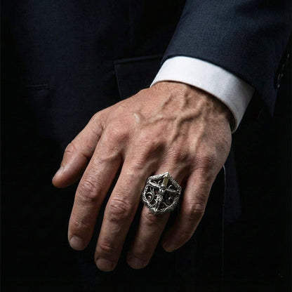 A handcrafted biker crucifix ring, showing the ornate details of the two-tone silver and gold-plated cross