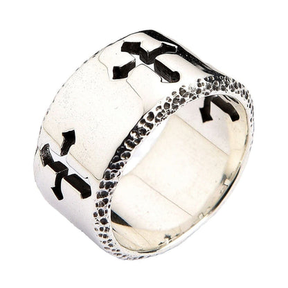 A bold and modern silver cross ring for men, featuring a unique and powerful perforated design.