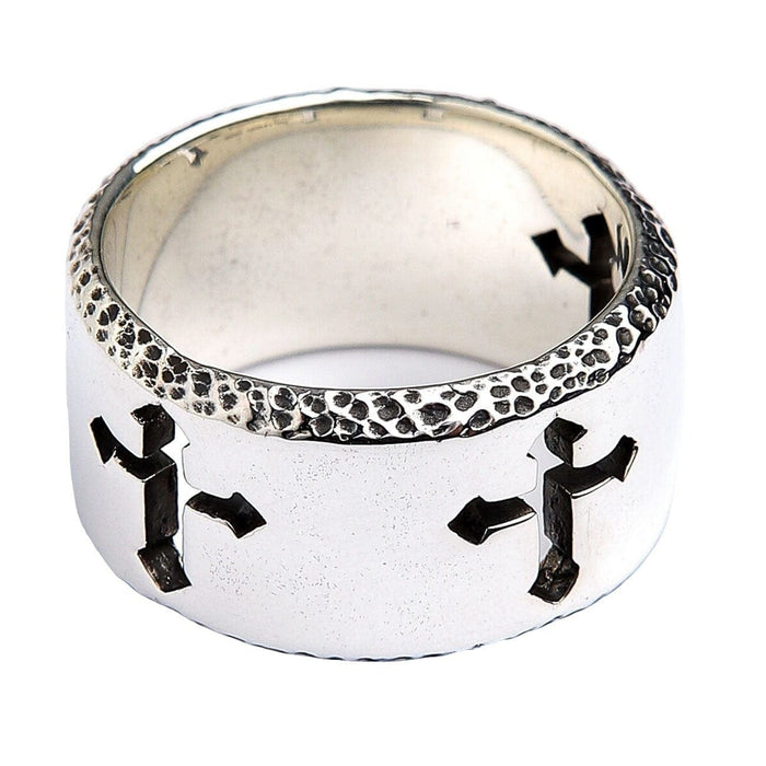 Standing .925 silver cut-out cross ring showing the smooth polished interior, perforated crosses, and stippled edge.