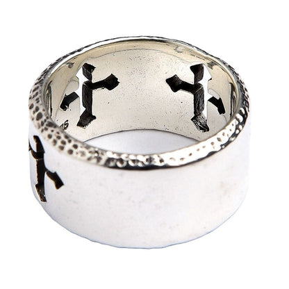 The inside view of the cut-out cross ring, showing the authentic .925 sterling silver hallmark stamp.