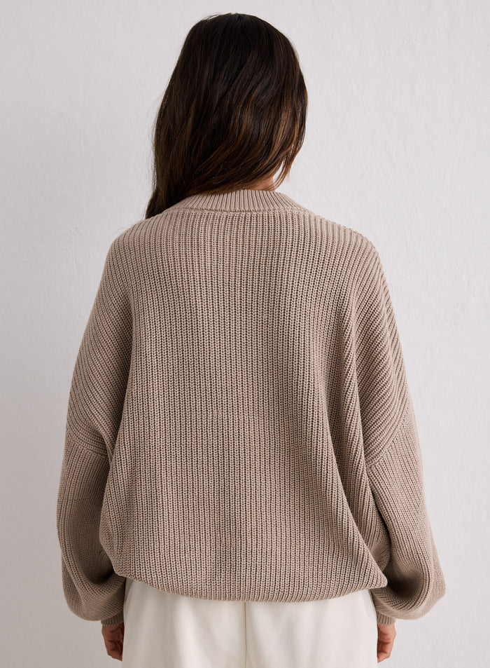 Back view of a woman wearing a Dark Clay Knitted Sweatshirt from aim'n [S-170cm]