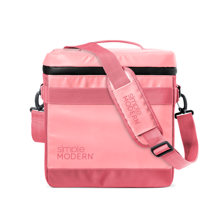 Pink and black minimalist design with soft pastel to coral tones, horizontal stripe detail, and metal hardware accents