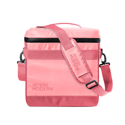 Pink and black minimalist design with soft pastel to coral tones, horizontal stripe detail, and metal hardware accents