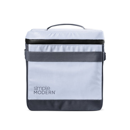 Light blue-gray tote bag with charcoal gray straps, trim, and bottom panel against a neutral background