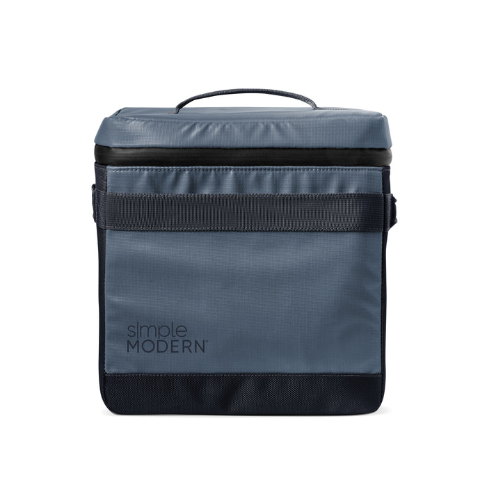 Slate blue-gray backpack with charcoal black accents and straps, featuring a cool-toned minimalist design.