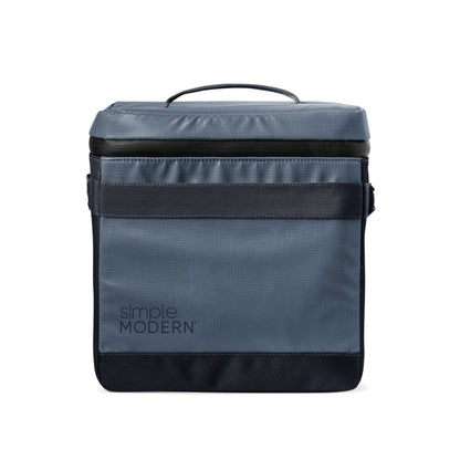 Slate blue-gray backpack with charcoal black accents and straps, featuring a cool-toned minimalist design.