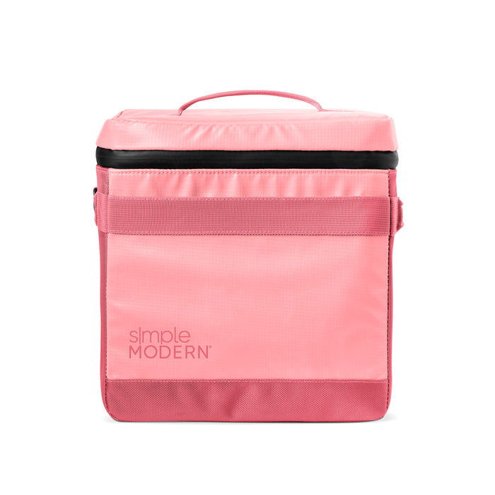 Coral pink insulated lunch bag with hot pink and magenta accents, featuring a black horizontal stripe across the upper section