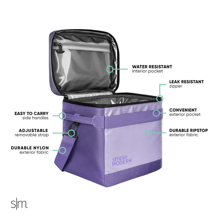 Vibrant purple and lavender two-tone clutch or bag with black interior lining, featuring color-blocked design with deep purple exterior and lighter lavender panels.