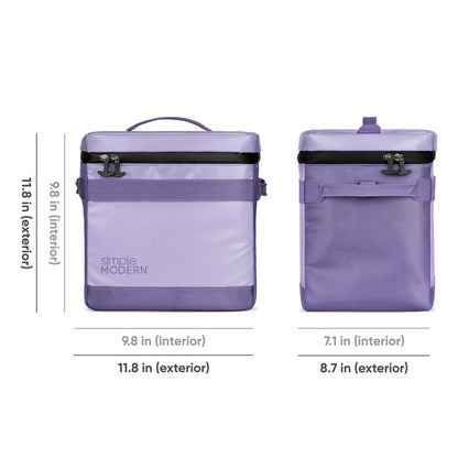 Soft lavender and light purple handbag with darker purple handles and straps, accented by black hardware and trim details