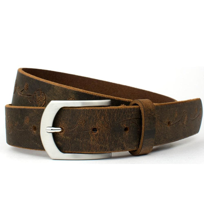 Distressed Rose Belt II. Silver-tone buckle. Casual strap features repeating embossed floral design.