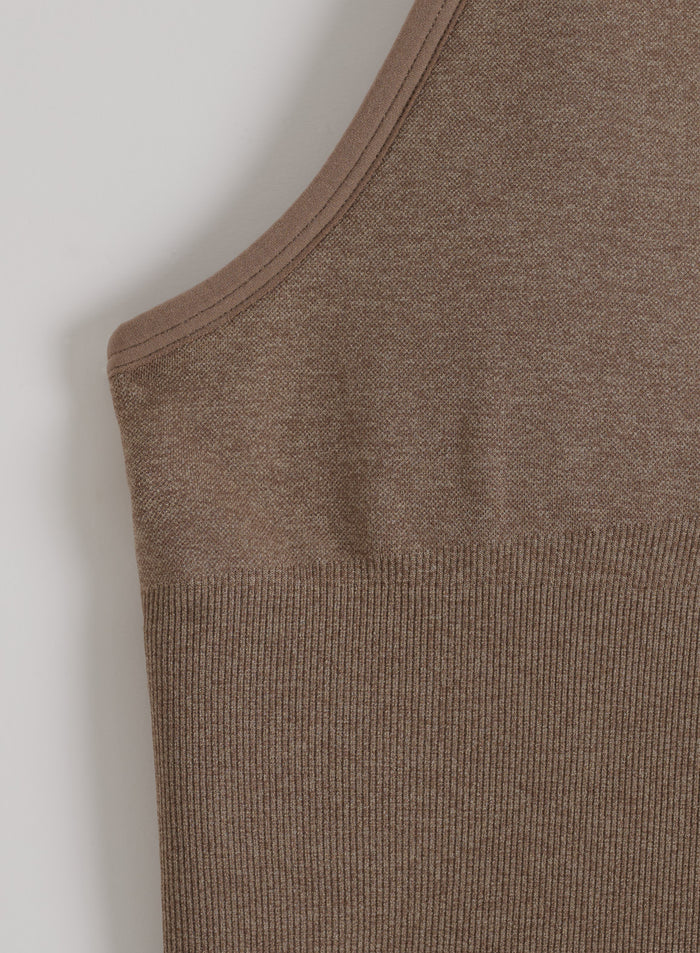 Espresso Melange Shape Seamless Cross Back Bralette by aim'n featuring ribbed texture in a close-up view.