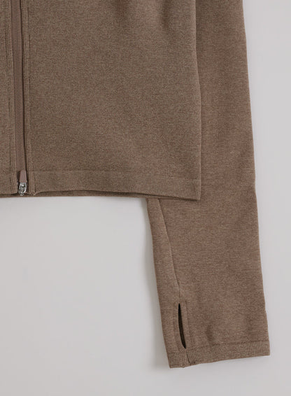 Espresso melange seamless zip jacket shown in a flat lay detail with ribbed hem and thumbhole sleeve.