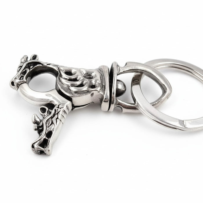 A side profile of the dragon head key fob, showing its 3-inch length.