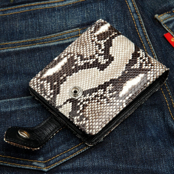 A beautifully handcrafted wallet made from premium cobra skin with a secure and stylish snap closure.