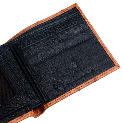 A close-up of the 'Genuine Ostrich Skin' stamp inside the black leather interior of the wallet.