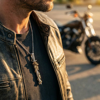 Man wearing gold dragon katana sword pendant with sterling silver scabbard and leather motorcycle jacket