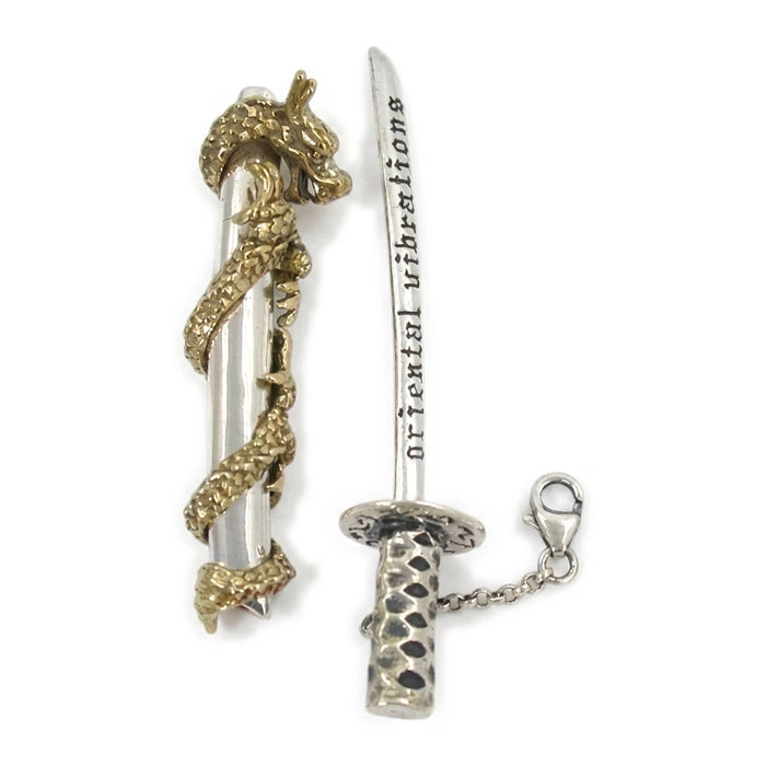 Vertical view of katana pendant set with gold dragon scabbard on left and oriental vibrations engraved sword on right